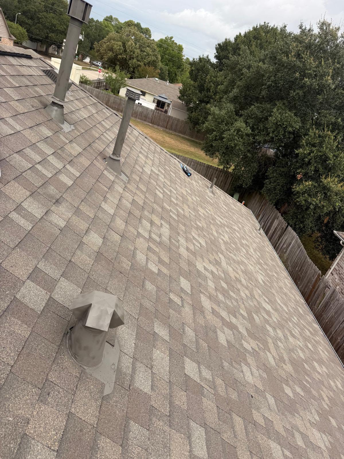 Pristine architectural roof installation by EliKay Roofing