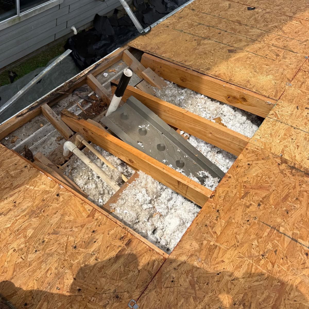 Decking inspection and leak repair by EliKay Roofing team